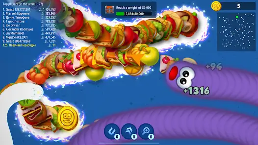 Worms Zone MOD APK v6.10.2 (Mega Menu, Unlocked All Costumes, Money) 1 Multicolored worm eating food and growing bigger in Worm Zone game